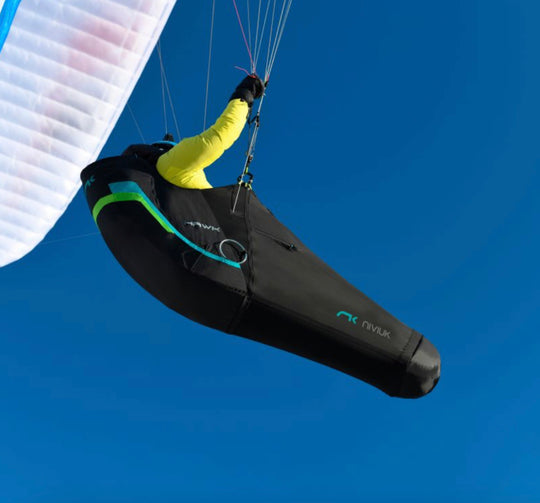 Niviuk Hawk pod harness in the sky