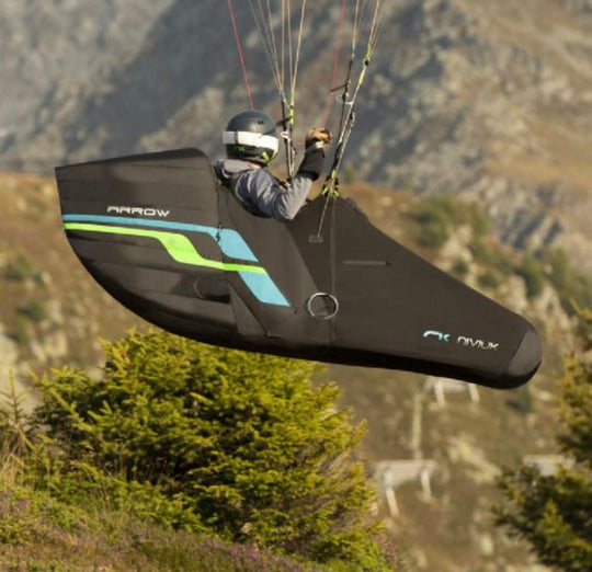 Niviuk Arrow paragliding pod harness in the sky